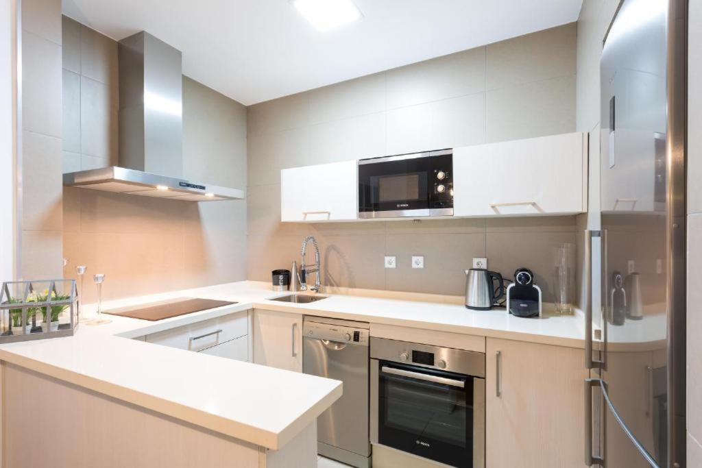 Atrivm San Julian Apartment Sevilla Bagian luar foto